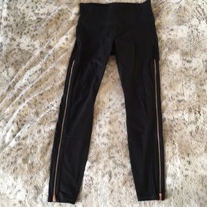 ⭐️ Athleta rose gold zipper high waisted leggings.